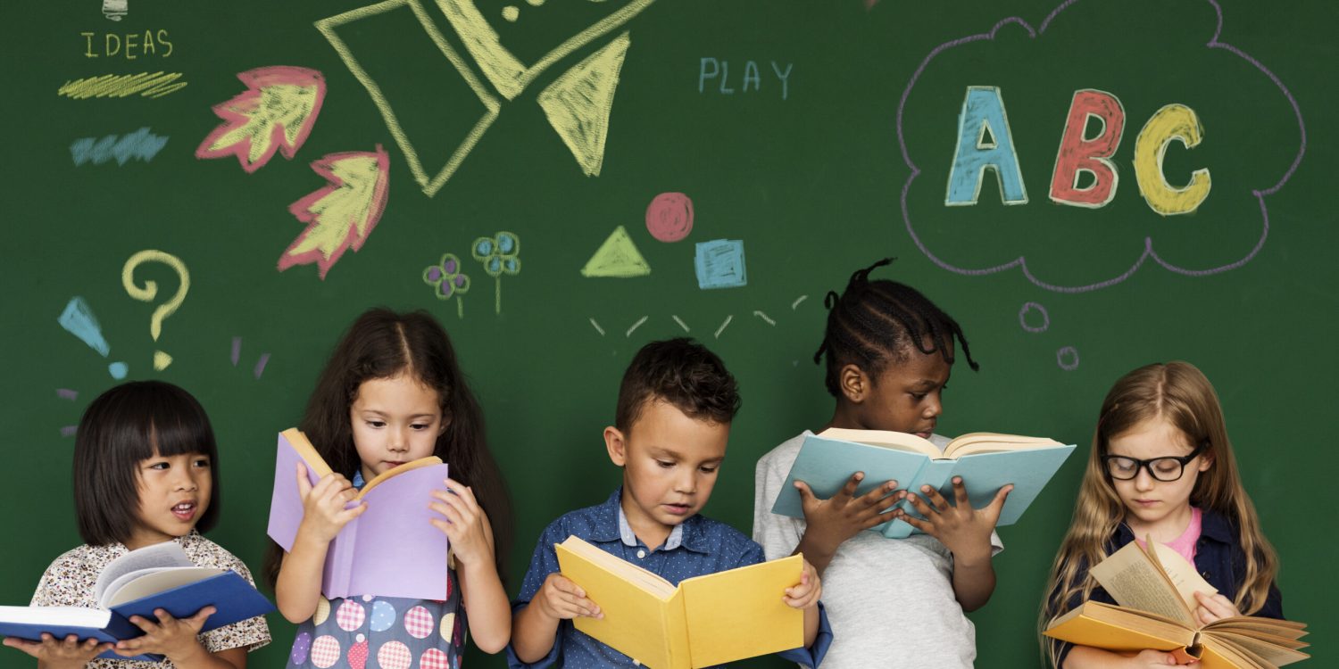 Diverse kids reading books